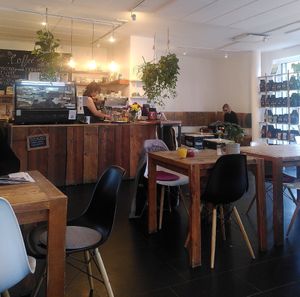 Sitting area and bar at 5 Senses Coffee - Wiesentalstraße in Freiburg