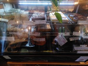 Vegan sweets including chai cake, crookie and tosti with hummus at 5 Senses Coffee - Wiesentalstraße in Freiburg