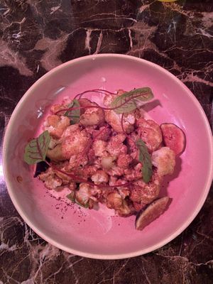 Cauliflower with figs  Photo looks pink due to heat lamp outside.   at Agora DC in Washington