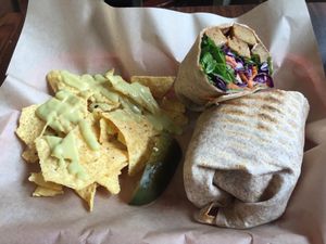 Vegan Banh mi sandwhich made into a wrap, with a side of vegan nachos at VO2 Vegan Cafe in Cambridge