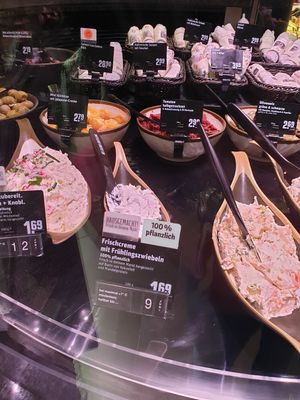Fresh cream cheese with spring onions at REWE Markt Altstadt-Lehel in Munich