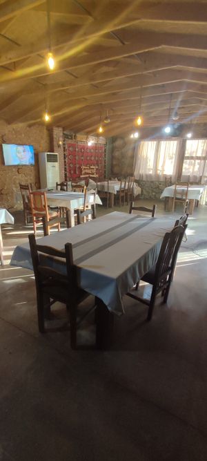 Indoor seating at Te Bujtina Tradicionale in Golem