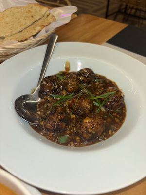 Manchurian. Vegetable balls dipped in spicy gravy   at Mokshu Vegetarian Cuisine in Canggu