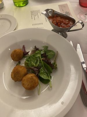 Arancini balls with spicy tomato sauce and salad (I asked for my sauce to be in a separate pot)  at Prima Donnas in West Wickham