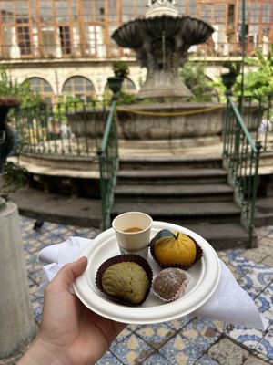 pistacchio conchiglia, coffee and almond sweet and a “mandarino"  at I Segreti del Chiostro in Palermo