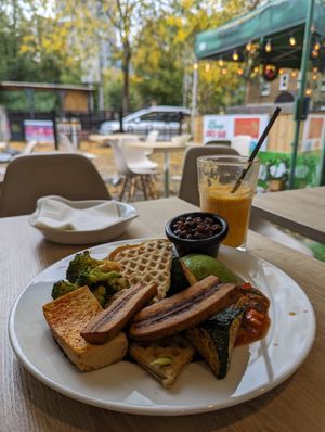 Buckwheat waffles with tofu, plantain, umami beans and mango salsa at Fed By Plants in South East London