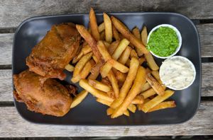 Tofish and chips with a dilly yogurt sauce and mushy peas at Fed By Plants in South East London