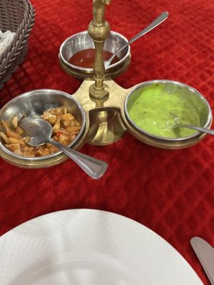 To go with provided bread. (Very yummy! The bright green one is not vegan, contains yogurt)  at Namaste Pais Indian Restaurant in Valencia