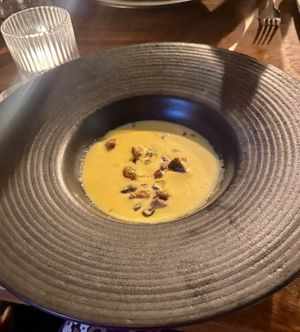 Butternut squash soup with roasted pistachios and breadcrumbs caramelized in brown sugar (vegan)  at Nuances - Restaurant in Nice