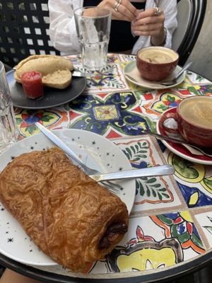 Napolitana and tomato toast. Coffee with homemade oat milk and teas.  at La Lectora Cafe Literario in Cadiz