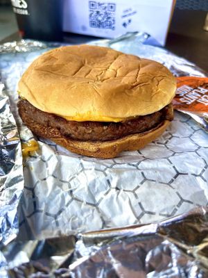 Eat plants kids cheeseburger   at Slutty Vegan in Dallas