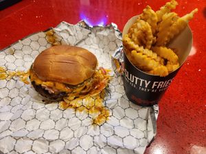 Super Slut burger and fries at Slutty Vegan in Dallas