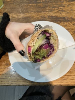 Half of the falafel wrap, best falafel wrap in London  at Fennec & Parsley in North London