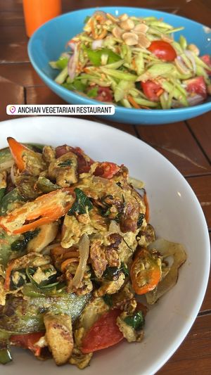 green mango salad and green curry omelette💗  at Anchan Vegetarian Restaurant in Chiang Mai