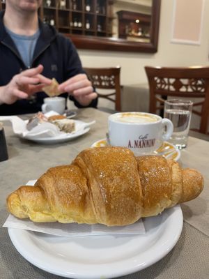 Vegan croissant with soia cappuccino.   at Pasticceria Nannini Conca D'Oro in Siena