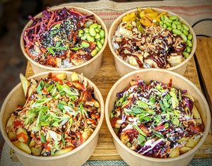 Loaded fries and crispy tofu rice boxes. at VG Coffee in Cambridge