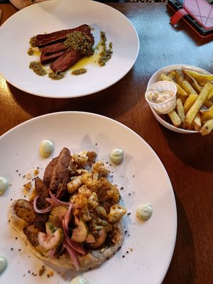 Up: bavette by Redefine Meat, comes with fries and salad. Below: Cauliflower at Ministerie van Geluk in Zoetermeer