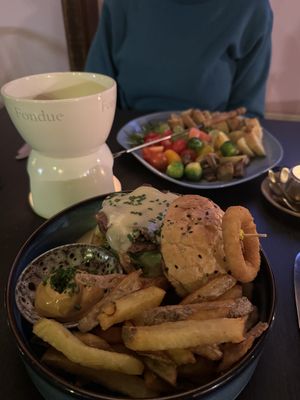 Yummy burger with fries and “cheese” fondue with veggies, fruit and breadd #Veganuary at Ministerie van Geluk in Zoetermeer