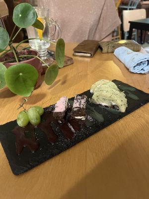 Grapes, rocky road and a coconut pandan cake.  at Ministerie van Geluk in Zoetermeer