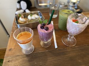 Parfait, matcha soy latte, fruit shake, panna cotta, and assorted pastries   at Bugoro All Vegan in Fukuoka