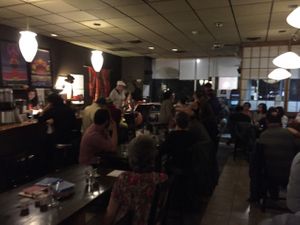 A live jazz band plays, while people dance at Gomen Kudasai in New Paltz