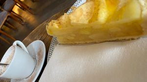 Vegan apple cake with oat milk babyccino   at Hoffmanns Sonnenhaus in Moenchengladbach