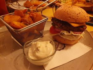 Vegan hamburger with gluten-free bun and steak potatoes at Mokka Étterem in Szarvas