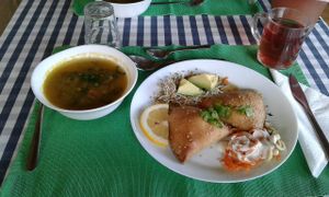 Sopa, esfiha de algas e chá de hibisco com limão. at Centro Tinkuy - Gracias a la Vida Association in Sintra