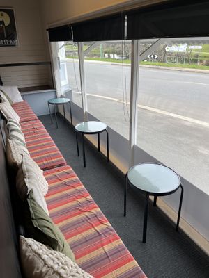 Cute enclosed verandah. Sit and watch the turbot chooks in the park across the road.  at Dixie Blue in Deloraine