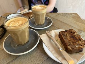 Oat coffee and vegan banana bread (toasted). Warning - they do give butter with it, but not actually on it.   at Fred & Ginger Coffee in Berkhamsted