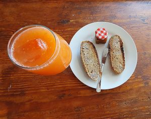 Desayuno con zumo de Pomelo 100% y tostada con paté siciliano.  at The Hangover Corner in Ibiza