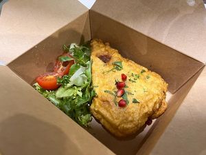 Fish with side salad at Meat The Vegans in North West London