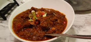 Curry goat at Meat The Vegans in North West London