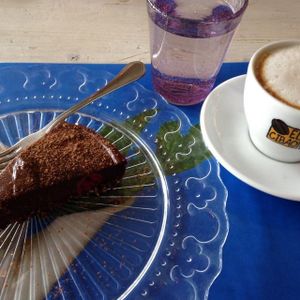 raw chocolate cake and soy cappuccino at Veganima in Arco