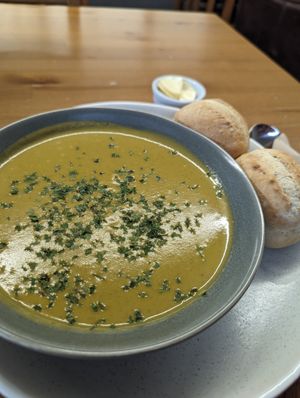 Thai green style soup with two rolls and vegan butter. at Y Siop Fach Sero in Ferndale