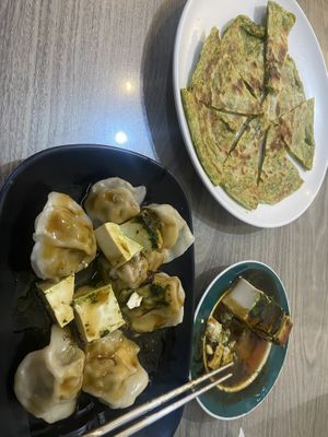 Dumplings, toon tofu, and toon pancakes (there was more on the plates before the photo was taken)  at Yang Shin Yuan Vegetarian - 養心園素食 in Chiayi