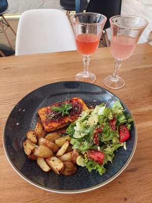 Main dish called booch plus kombucha (dark pink) and water kefir (light pink) at Booch Cafe in Riga