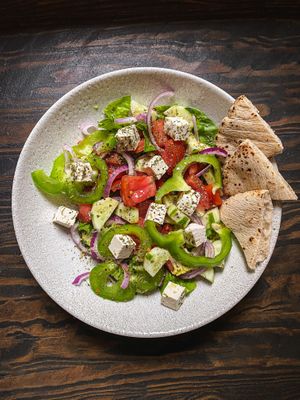 Authentic greek salad with LifeTree Veta cheese, extra virgin olive oil from Spain. at Booch Cafe in Riga