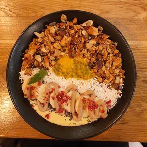 mango smoothie bowl at Booch Cafe in Riga