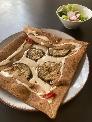 Galette with fried aubergine, satar & tahini (vegan) at Planeige  in Berlin