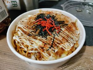 Okonomiyaki on a bed of noodles at Hola Vege - 歐拉蔬食工坊 in Kaohsiung