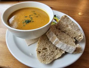 Roast butternut and curried sweet potato soup with warm sourdough and flora spread at Wildheart Animal Sanctuary Cafe in Sandown