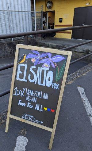 sign near pickup area at El Salto PDX in Portland