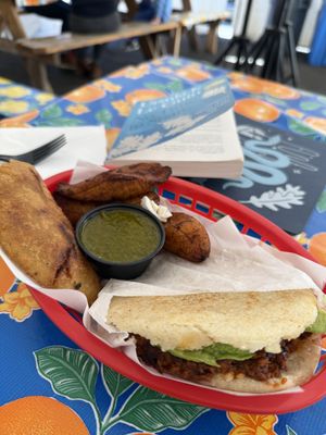 Soyrizo arepa, empanada, and plantains   at El Salto PDX in Portland