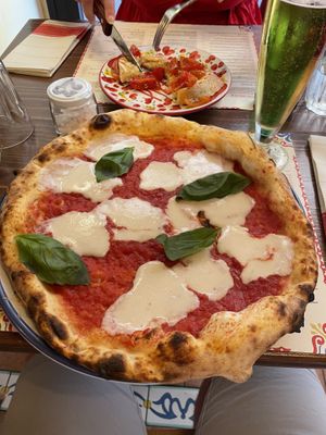 Vegan margarita with homemade vegan cheese! So good   at Pizzium in La Spezia