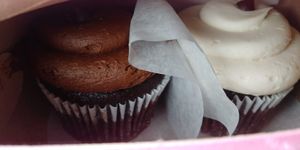 Vegan Chocolate Cupcakes, one with chocolate Icing and the other with vanilla Icing at Icing on the Cake in Los Gatos