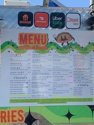 Menu on side of food truck at Vegan Vatoz in Riverside