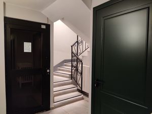 Stairs and lift down to the toilets at Il Centrale Stresa in Stresa