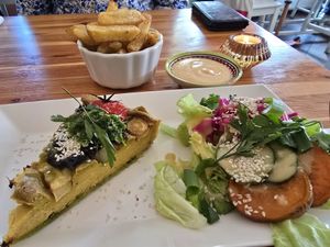 Quiche with salad & fries on the side at Café Lief  in Haarlem