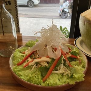 Pomelo and palm fruit salad. Classic Khmer dish  at Sundays  in Phnom Penh